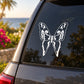 Butterfly vinyl decal with white outline on a dark car window
