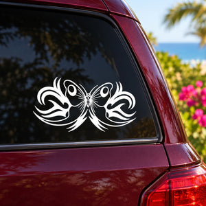 White butterfly vinyl decal with symmetrical wings on car window