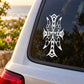 Butterfly vinyl car decal with white intricate wings on dark window glass