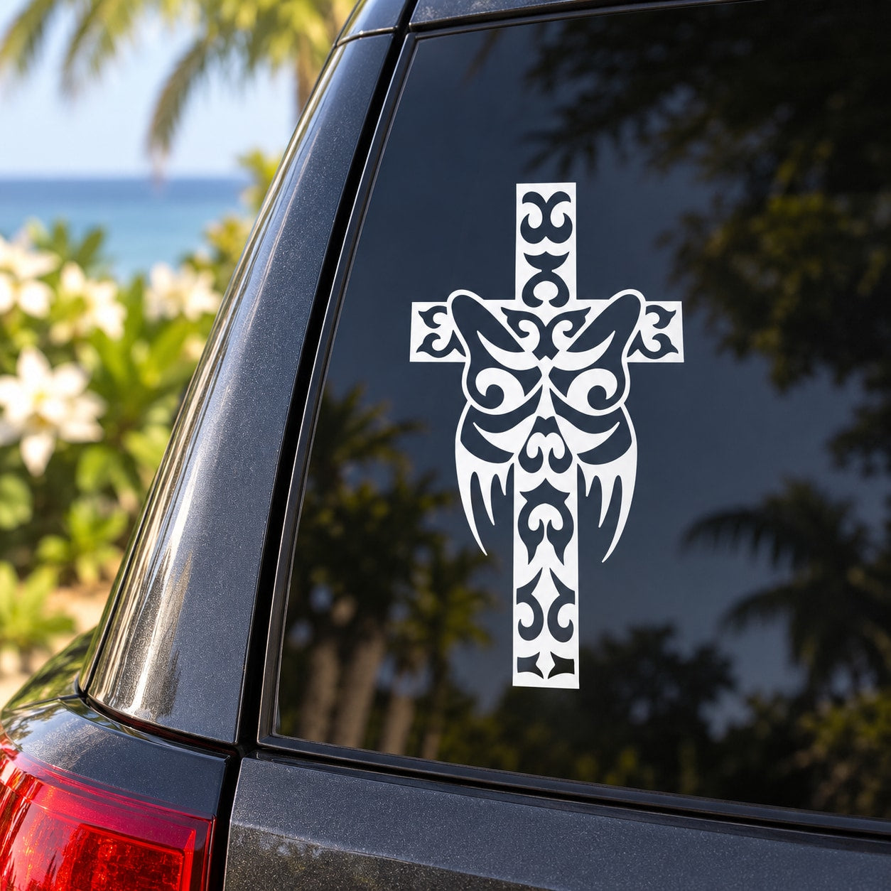 Butterfly cross vinyl decal in black and white on car window