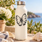 Tiger butterfly decal on a white bottle with a bold black wing graphic