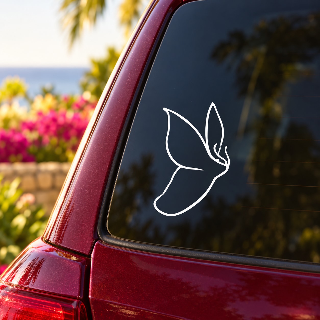 Thin-lined flying butterfly decal with white outline on car window