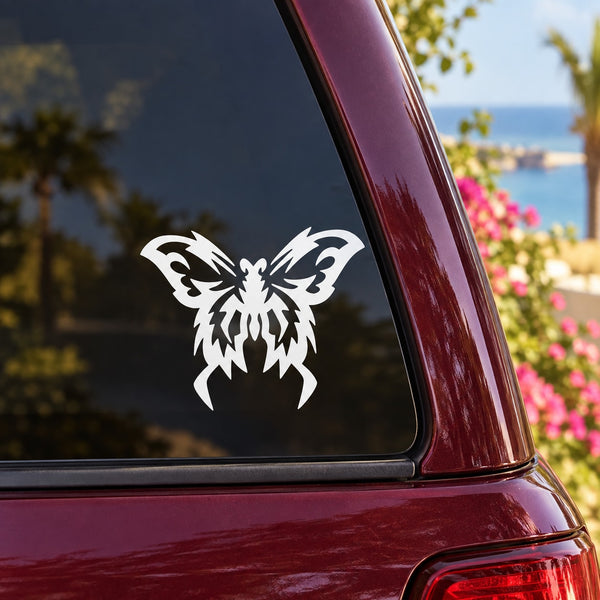 White tribal butterfly decal on a maroon car window