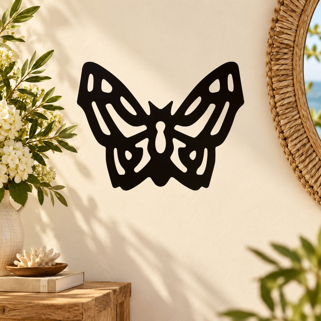 Modern black butterfly wall decal with thick lined cutout pattern