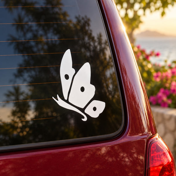 White butterfly decal sticker on car window