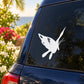 White butterfly decal on dark car window