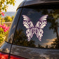 Purple butterfly vinyl decal on dark car window glass