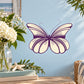 Butterfly vinyl wall decal with purple and cream wings, star and dot details