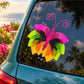 Colorful butterfly vinyl decal with swirls on car window