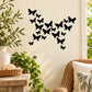 Butterfly wall decal featuring a cluster of black butterflies
