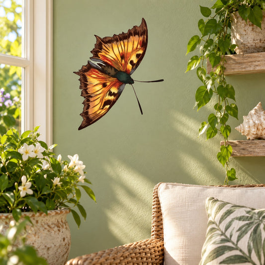 Colorful orange and black butterfly wall decal on light green wall