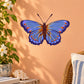 Blue butterfly wing spread wall decal with detailed blue wings and antennae