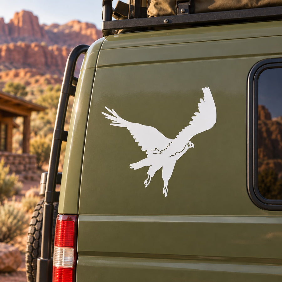 Buzzard vulture decal with white bird silhouette on dark vehicle