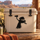 Cartoon flying vulture decal, black silhouette on a light-colored cooler lid