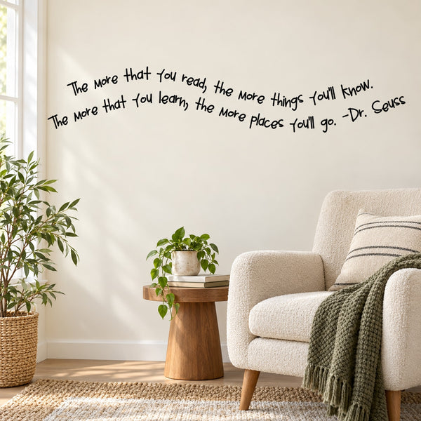 Dr. Seuss wall decal with reading quote in black lettering on a light wall