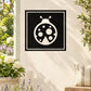 Square frame ladybug wall decal with white ladybug icon on black background