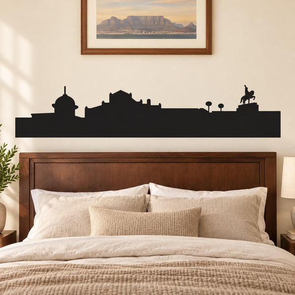Black skyline vinyl wall decal with buildings, streetlamps, and seated silhouette figure