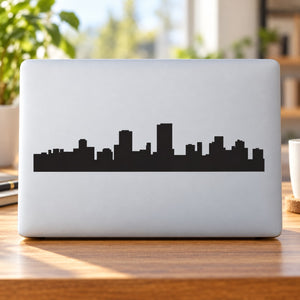 City skyline decal with Cape Town silhouette in black on light gray laptop lid