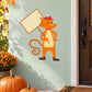 Orange cartoon cat sign sticker, cat holding a blank speech board