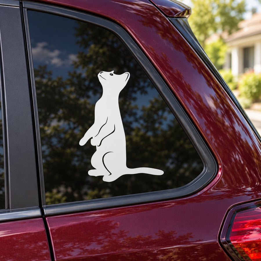 Cat sitting up decal with white silhouette on car window glass