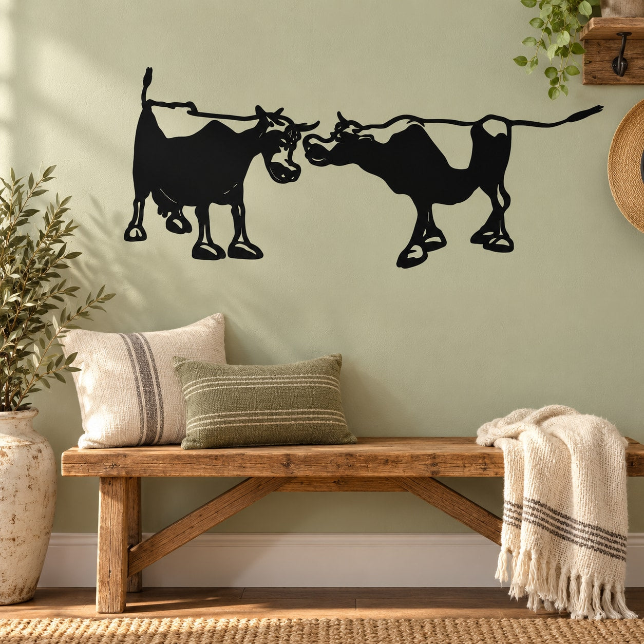 Cow couple wall decal with two black silhouette cattle facing each other