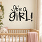 Girl wall decal reading "It's a Girl!" in black lettering