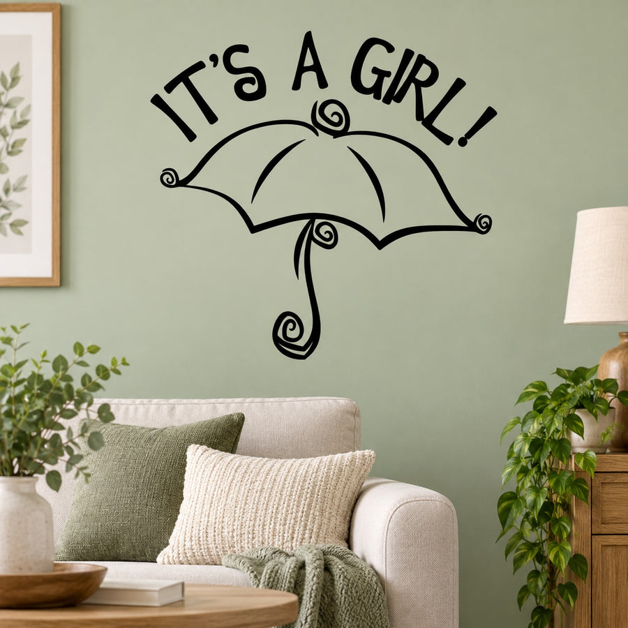 Baby shower wall decal with “It’s a girl!” text and umbrella outline