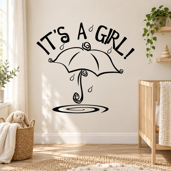 Baby shower wall decal: black "It's A GIRL!" text with raining umbrella and raindrop accents