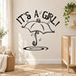 Baby shower wall decal: black "It's A GIRL!" text with raining umbrella and raindrop accents