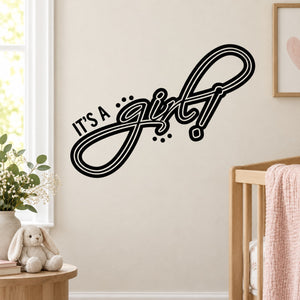 Baby shower girl text wall decal with “It’s a girl” script in black