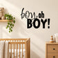 Black wall decal featuring “boy, oh BOY!” lettering for baby shower decor