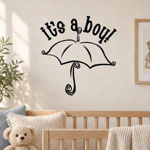 Baby shower wall decal featuring 'It's a boy!' with black umbrella and swirls