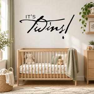 Twins celebration wall decal with black "It's Twins!" script lettering