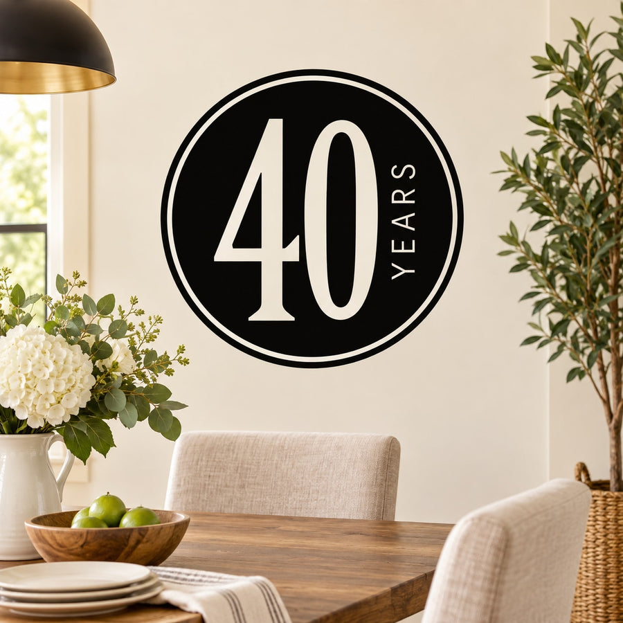Round black wall decal with bold '40' and 'Years' text, celebration circle design