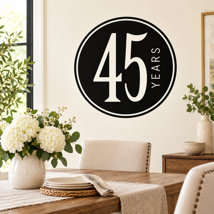 Black circular decal with large '45' and vertical 'YEARS' text