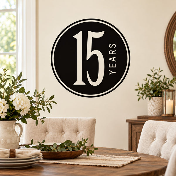 Black circular "15 YEARS" celebration wall decal