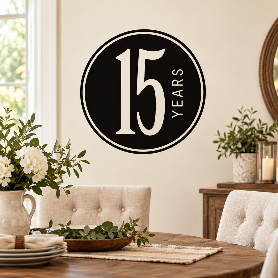 Black circular "15 YEARS" celebration wall decal