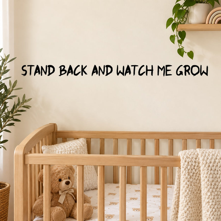 Wall decal with bold quote text: Stand back and watch me grow