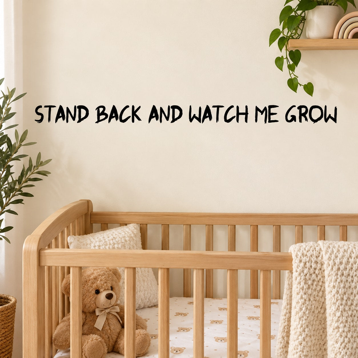 Wall decal with bold quote text: Stand back and watch me grow