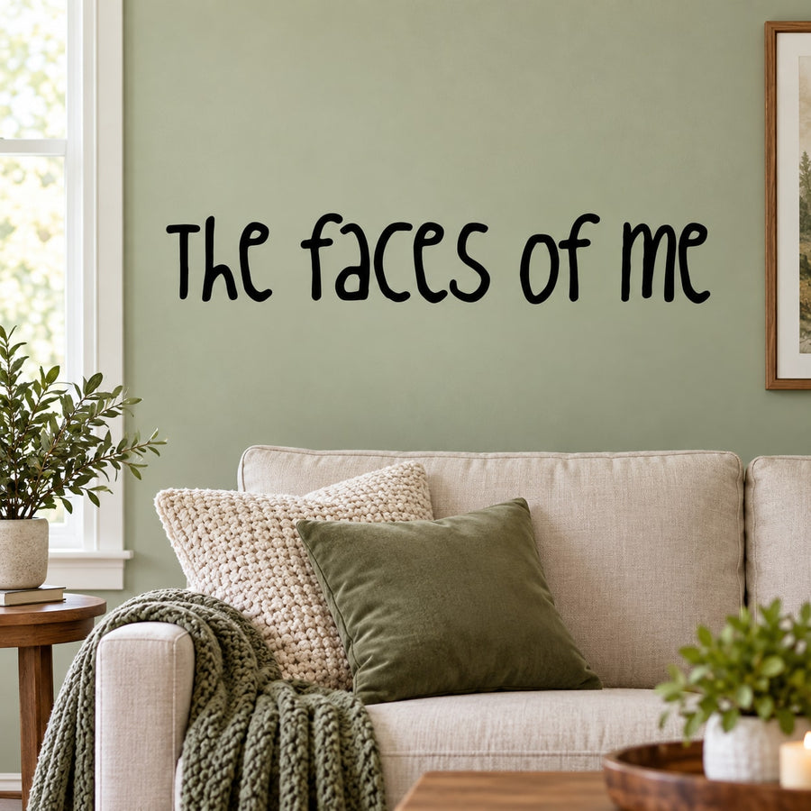 Wall decal with hand-lettered phrase "The faces of me"