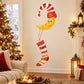 Moon holding a red striped stocking die-cut wall decal with a smiling face