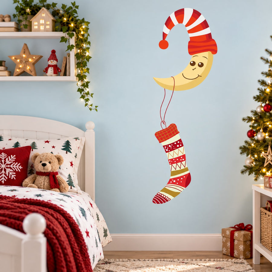 Smiling moon cartoon die-cut decal with Santa hat and red striped stocking