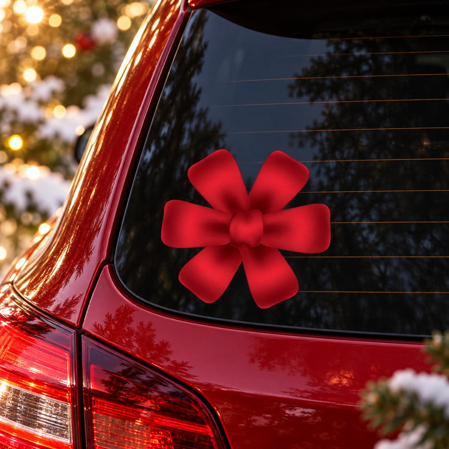 Red Christmas bow ribbon sticker on car rear window