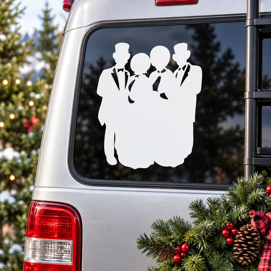 Christmas carolers decal with white silhouette of singers on a car window