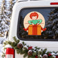 Circular child opening present sticker with cartoon boy holding a red gift box