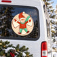 Die-cut decal sticker of a child making a snow angel, round cream background