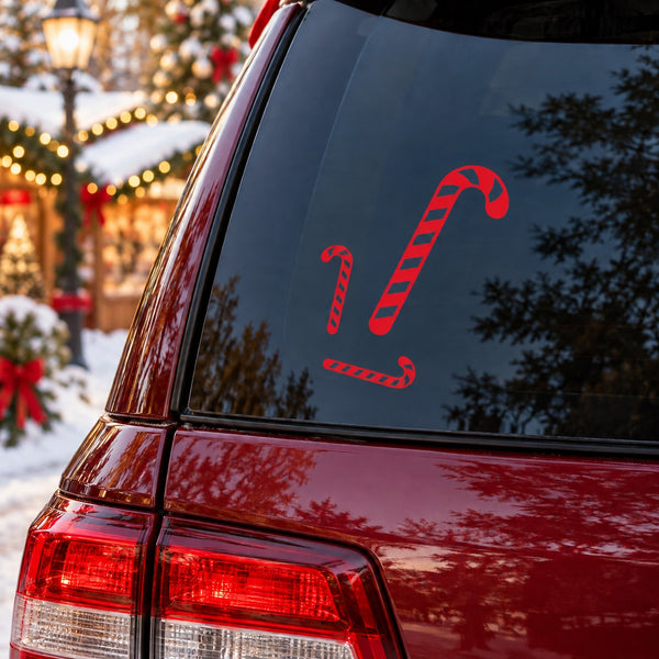 Red candy cane-style Christmas sticker on car rear window