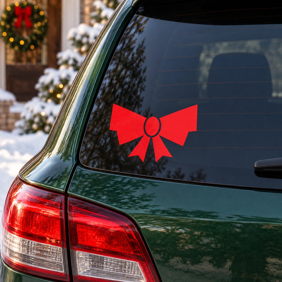 Red ribbon bow vinyl decal on car rear window