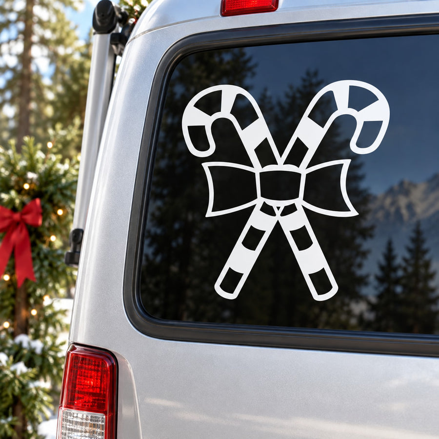 White crossed candy cane decal on car window