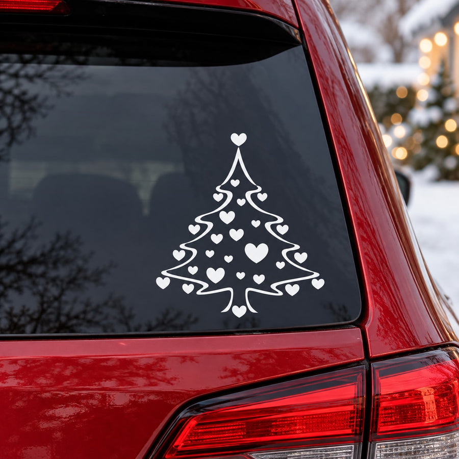Heart-covered Christmas tree car decal, white outline with small hearts